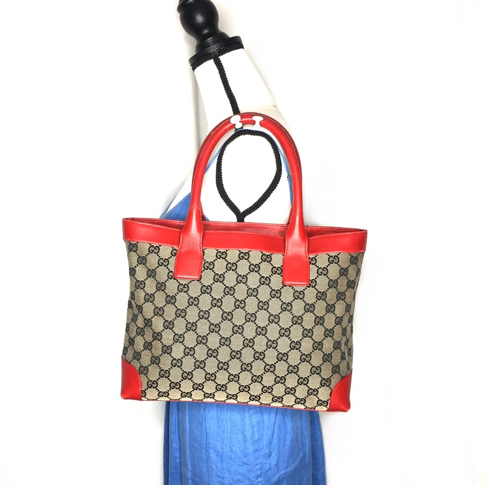 Authentic Gucci red leather monogram canvas tote bag